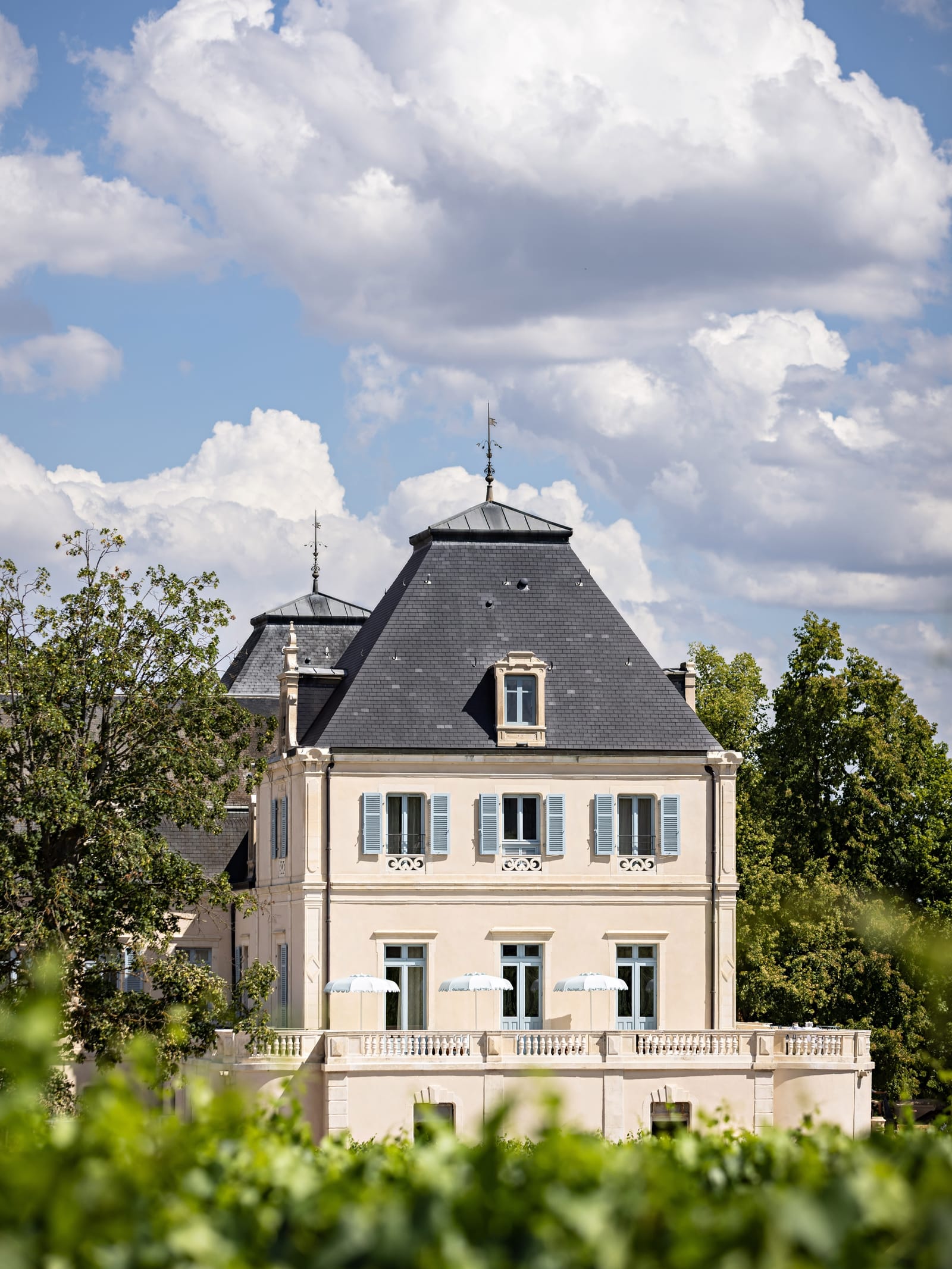 A lived in kitchen, a château and a glass of Burgundy